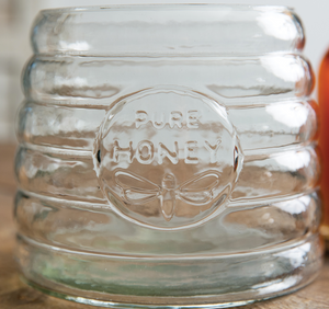 Bote de vidrio de colmena de miel