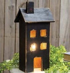 Maison lumineuse noire moyenne en bois vieilli 