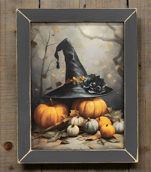 Rustic framed Halloween print of a black witch hat surrounded by orange, cream, and green pumpkins.