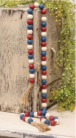 *Guirlande de perles rouges, blanches et bleues avec pompons