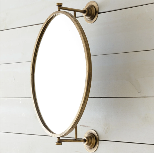 Espejo ovalado enmarcado